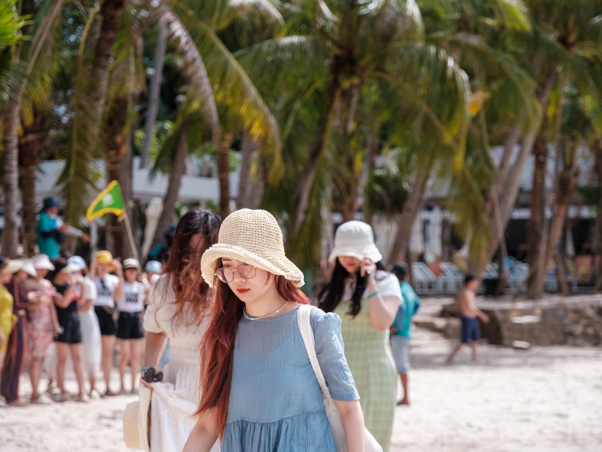 Foldable Straw Beach Hats styled for promotional and event use